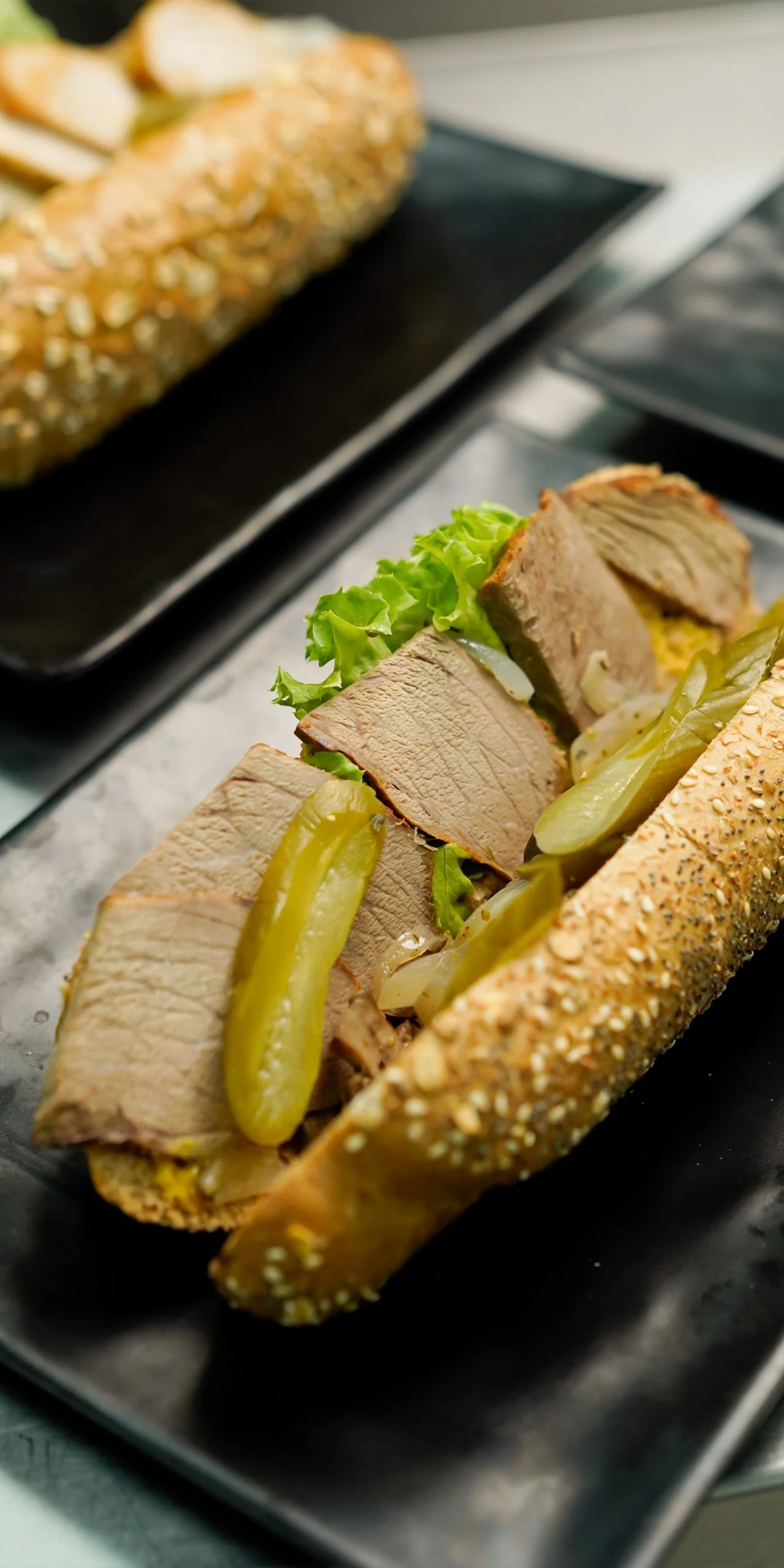 Freshly filled sesame baguettes, carefully prepared for service